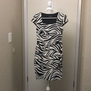 Office business form fitting b/w dress.